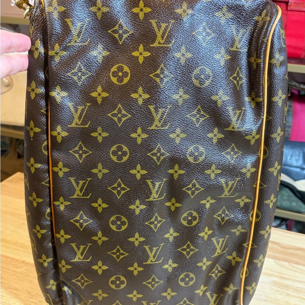 Louis Vuitton Evasion Monogram Travel Bag - Picture 6 of 16